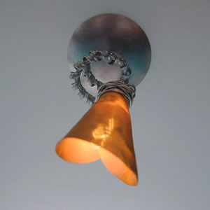 Wall sconce and ceiling light like candle holders that add to the beauty of your home.